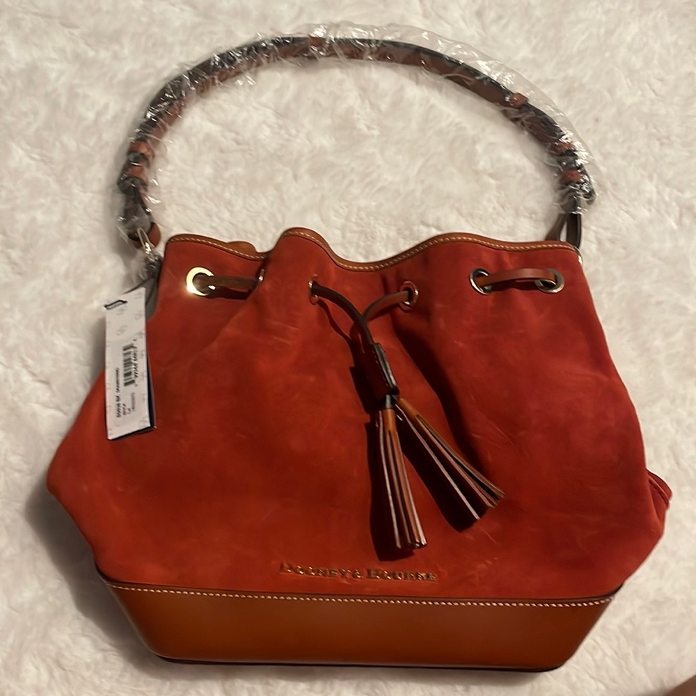 Brand new drawstring, suede, orange rust , dark brown leather trim